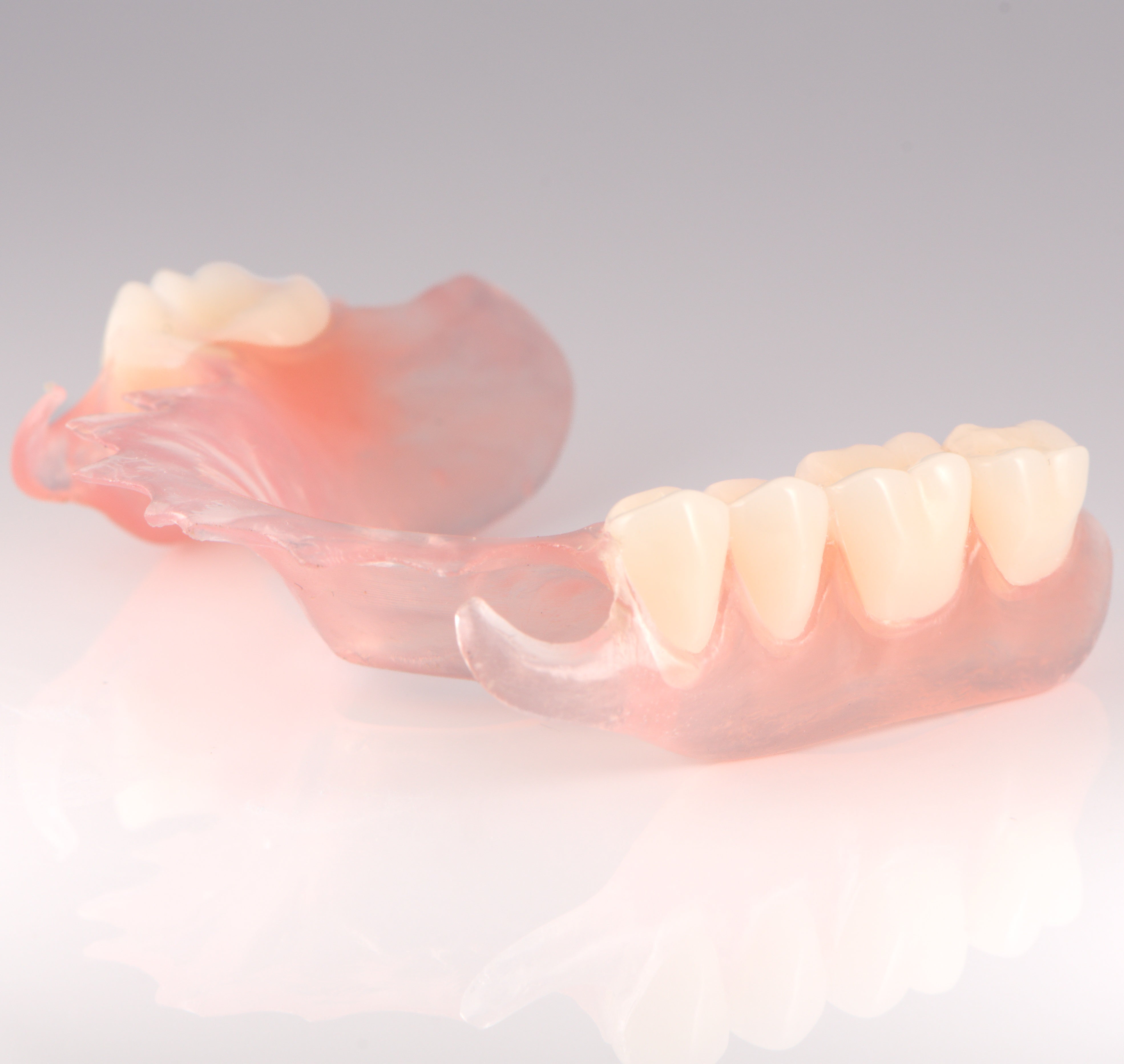 Flexible Partial Denture on Gray Background