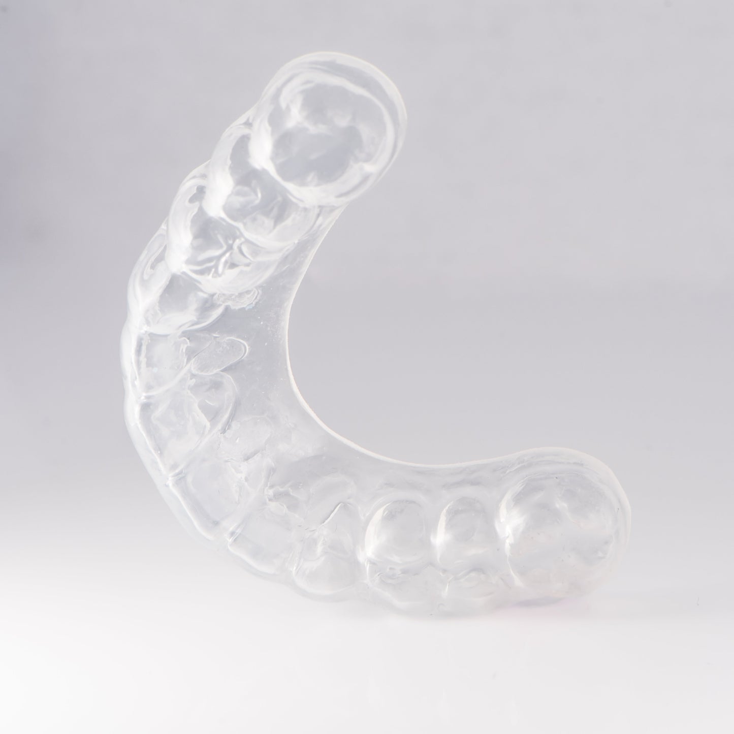 Clear Sports Mouthguard with Light Gray Background
