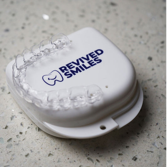 Essix Retainer on top of storage case