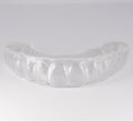 Clear Sports Mouthguard with Light Gray Background