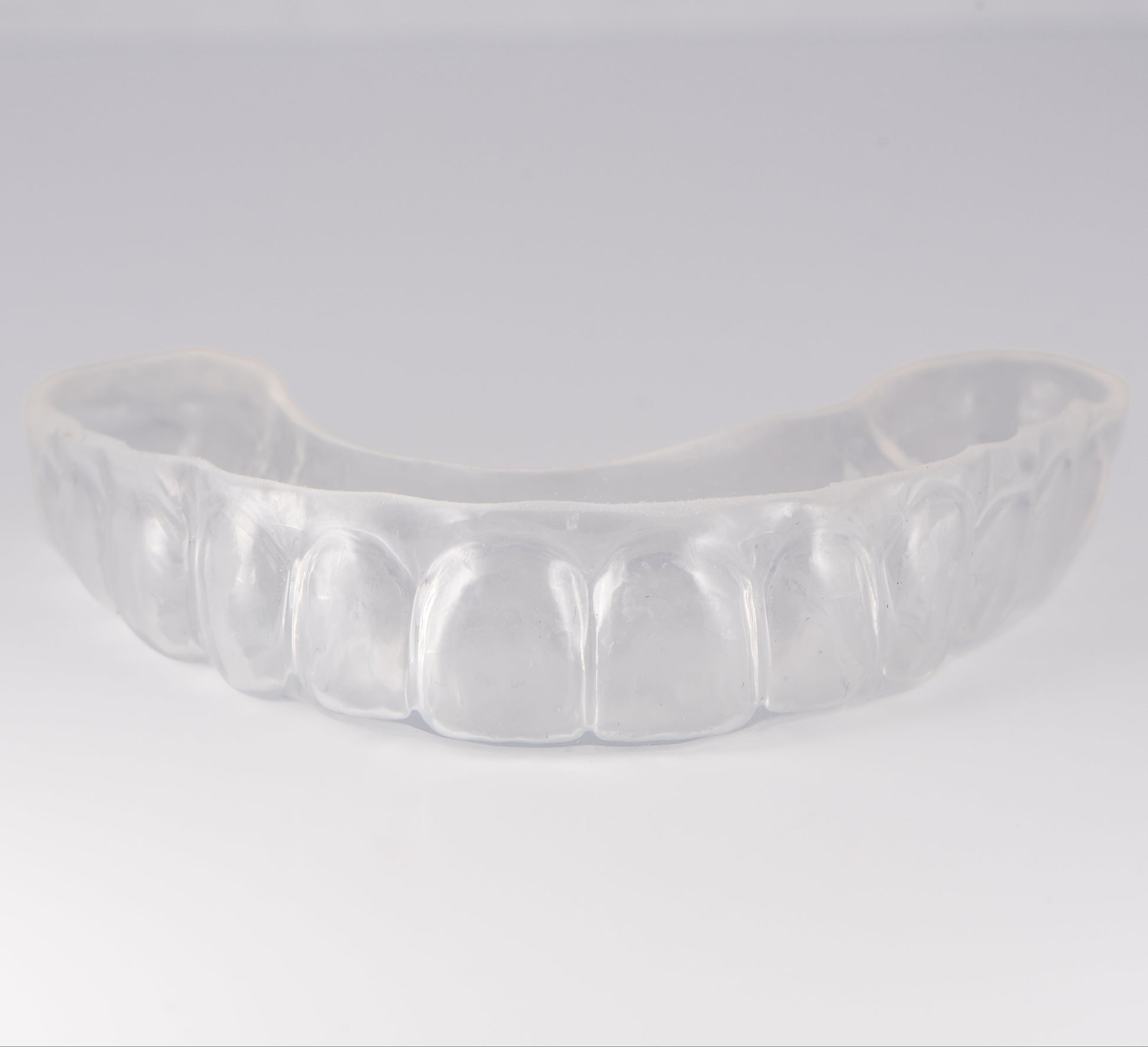 Clear Sports Mouthguard with Light Gray Background