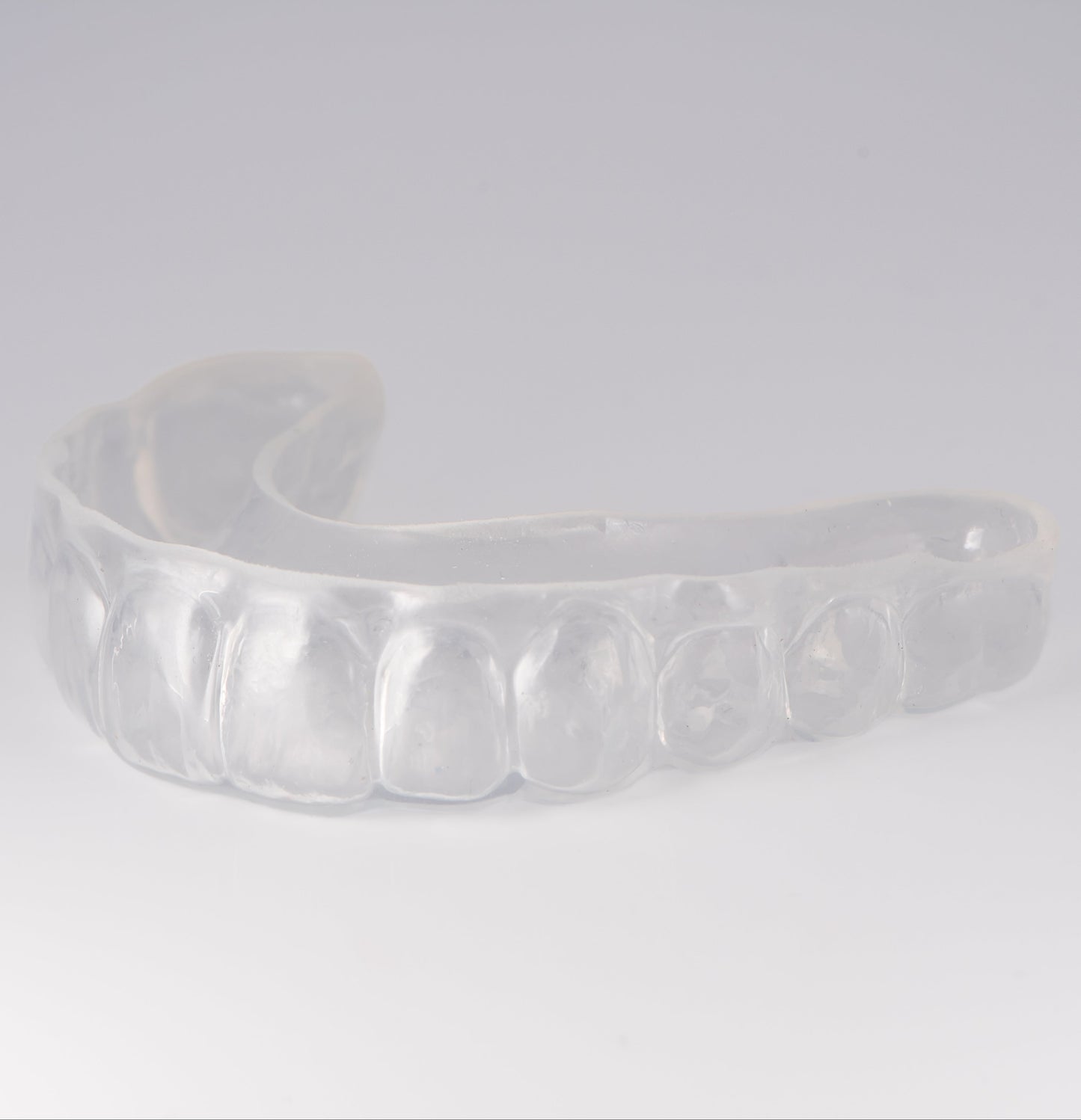 Clear Sports Mouthguard with Light Gray Background