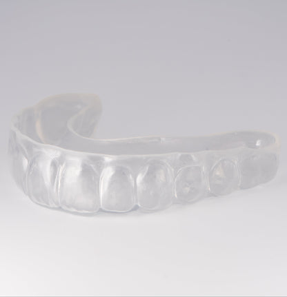 Clear Sports Mouthguard with Light Gray Background