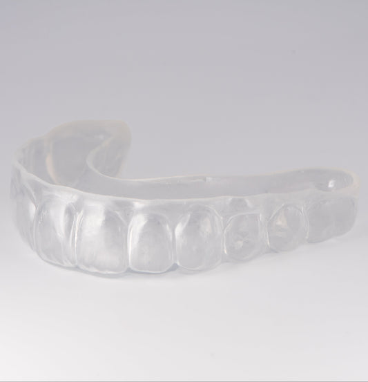 Clear Sports Mouthguard with Light Gray Background